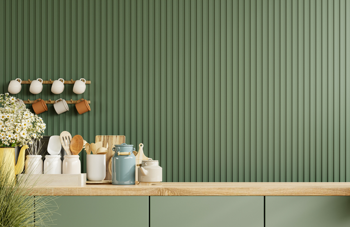 teksturētas zaļas krāsas sienas fasādes